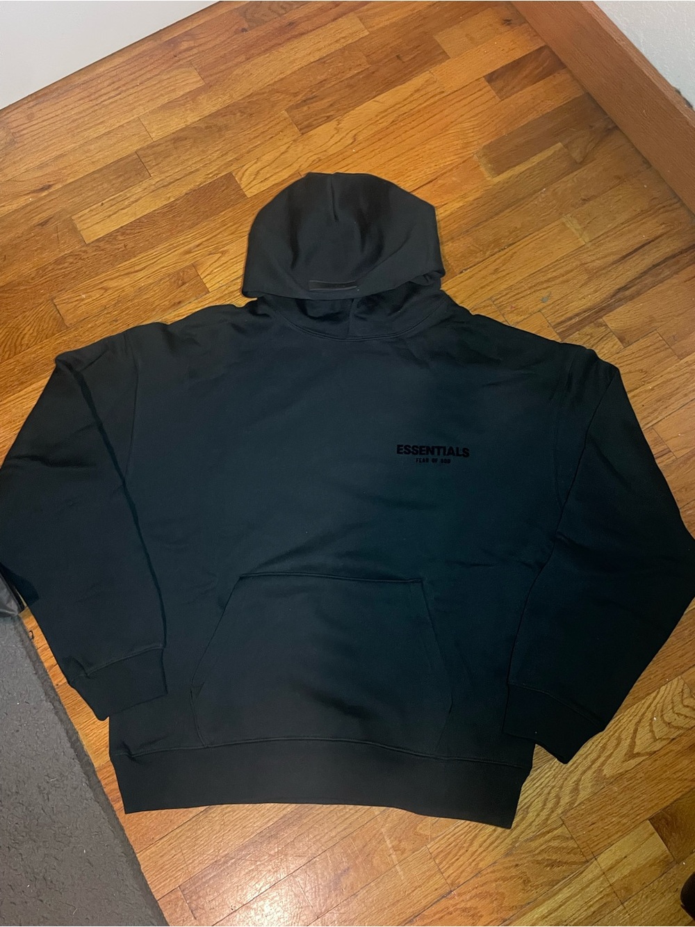 Essentials Black Pullover Hoodie with Subtle Logo